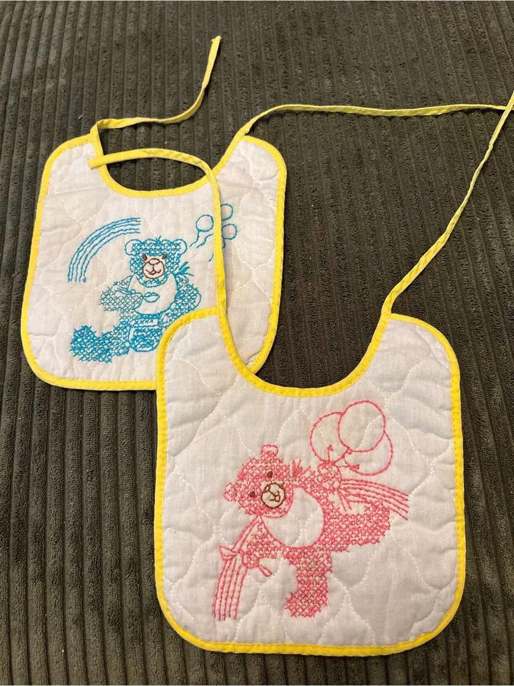 Vintage pair of Yellow-Trim Quilted Baby Bibs with Blue & Pink Bear Embroidery